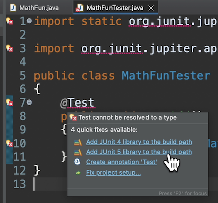 Quick fix dialog box resulting from hovering over the @Test annotation. Shows 4 quick fix options. The 2nd option is “Add JUnit 5 library to the build path”.